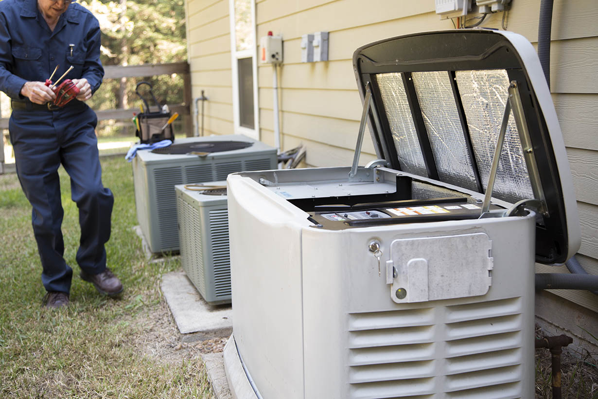 Technician services outside AC units and generator. Technician services outside AC units and generator